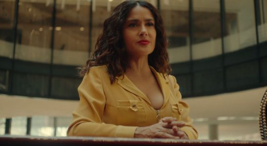 Salma Hayek standing looking out in Black Mirror.