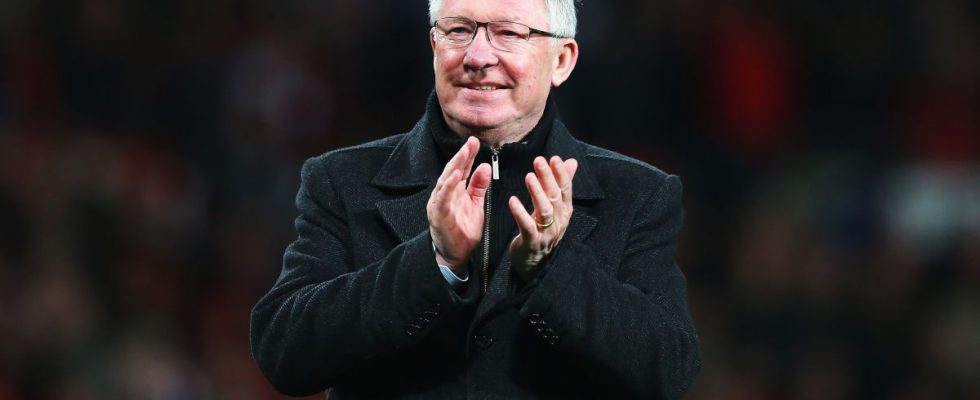 Football manager Alex Ferguson looking happy.