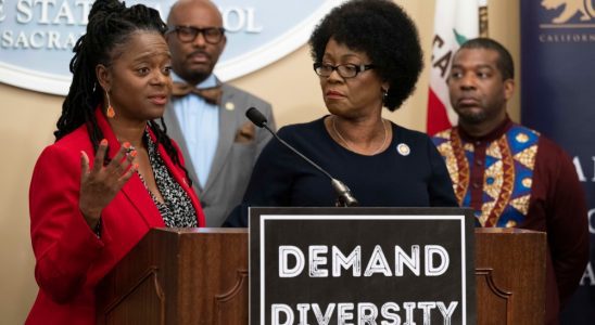 (From left) Senator Lola Smallwood-Cuevas is flanked by Assemblymembers Mike Gipson, Tina McKinnor and Corey Jackson as she addresses the removal of Black female DEI studio executives during the California Legislative Black Caucus press conference.