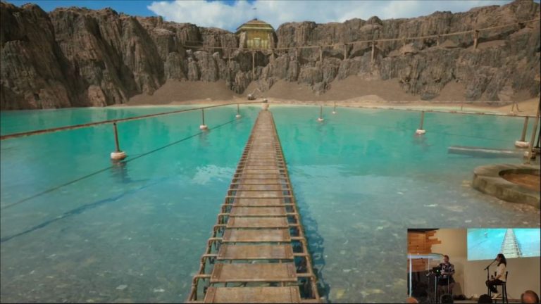 on-stream view of gameplay from the remake of Riven: The Sequel to Myst, showing a boiler on the shore of a crater lake with scaffolding going out into the middle of the lake