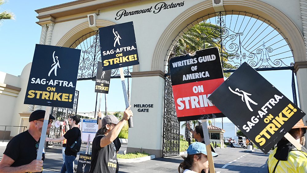 SAG-AFTRA and WGA Members and Supporters walks the picket line in support of the SAG-AFTRA and WGA strike at the Paramount Pictures Studio on July 14, 2023 in Los Angeles, California.