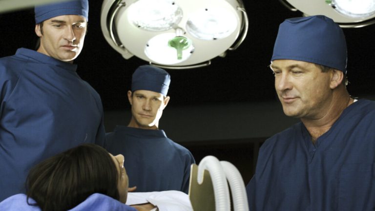 Julian McMahon as Dr. Christian Troy, Dylan Walsh as Dr. Sean McNamara, and Alec Baldwin as Dr. Barrett Moore in 