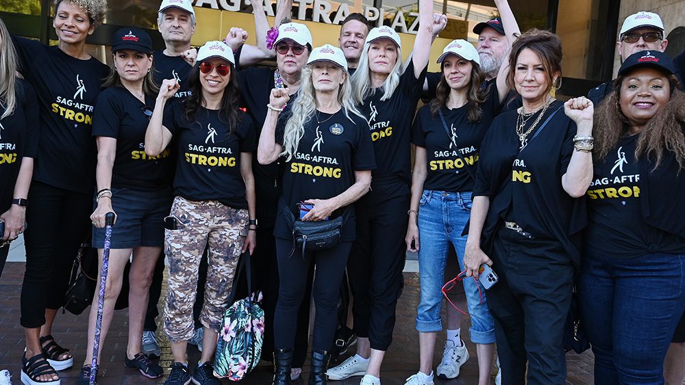 Frances Fisher, Joely Fisher, Members and Supporters walks the picket line in support of the SAG-AFTRA and WGA strike at the SAG-AFTRA Building on July 14, 2023 in Los Angeles, California.