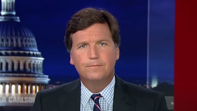 Tucker Carlson pursed lips on Tucker Carlson Tonight