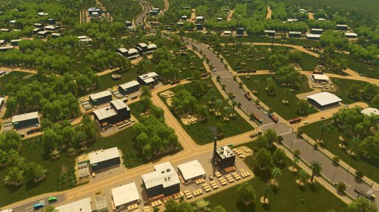 Des jeux comme Sims : Une vue aérienne d'une ville tentaculaire, avec de nombreux espaces verts compensés par des usines industrielles.