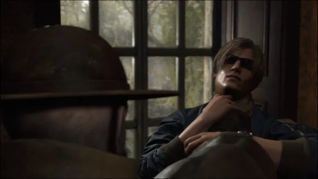 Leon s'étouffe dans Resident Evil 4 Remake.