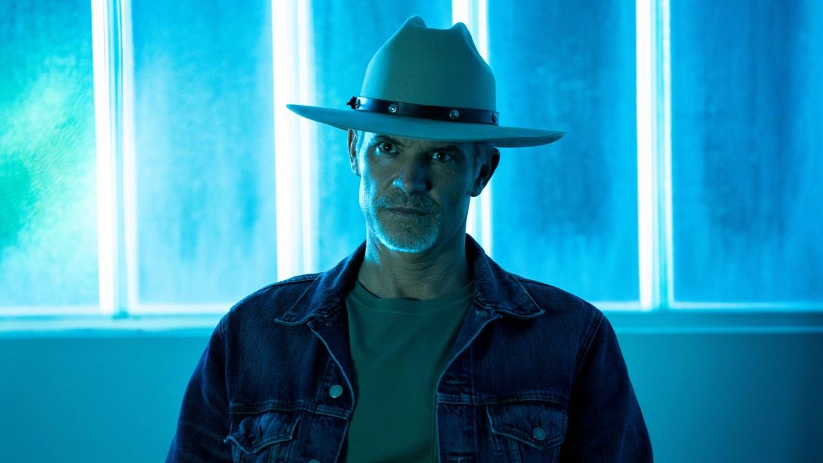 Raylan Givens in interrogation roomin blue light on Justified: City Primeval