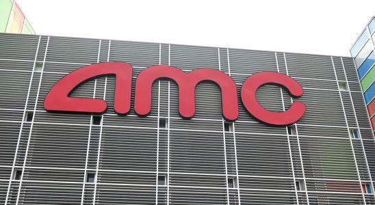 LAS VEGAS, NEVADA - AUGUST 20:  People enter AMC Town Square 18 on August 20, 2020 in Las Vegas, Nevada. AMC Theatres reopened more than 100 of its movie theaters across the United States today, with new safety precautions in place, for the first time since closing in March because of the coronavirus (COVID-19) pandemic. In celebration of its 100th anniversary, the world's largest theater chain is welcoming guests back with a "Movies in 2020 at 1920 Prices" promotion for one day by offering 15-cent tickets to classic and previously-released films and USD 5 concession items. Starting on August 21, older movies will be shown for USD 5 a ticket. According to AMC, enhanced cleaning and safety protocols include disinfecting theaters before each show, mandatory face coverings for employees and customers, upgraded air filtration systems where possible, and high-touch points cleaned throughout the day. Hand sanitizer and disinfectant wipes are available throughout the theaters, auditoriums are at 40 percent capacity or less, and concession menus have been simplified for shorter lines and quicker service.  (Photo by Ethan Miller/Getty Images)