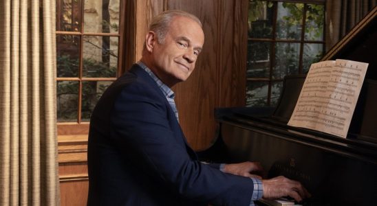 Frasier playing piano in press shot for Frasier revival