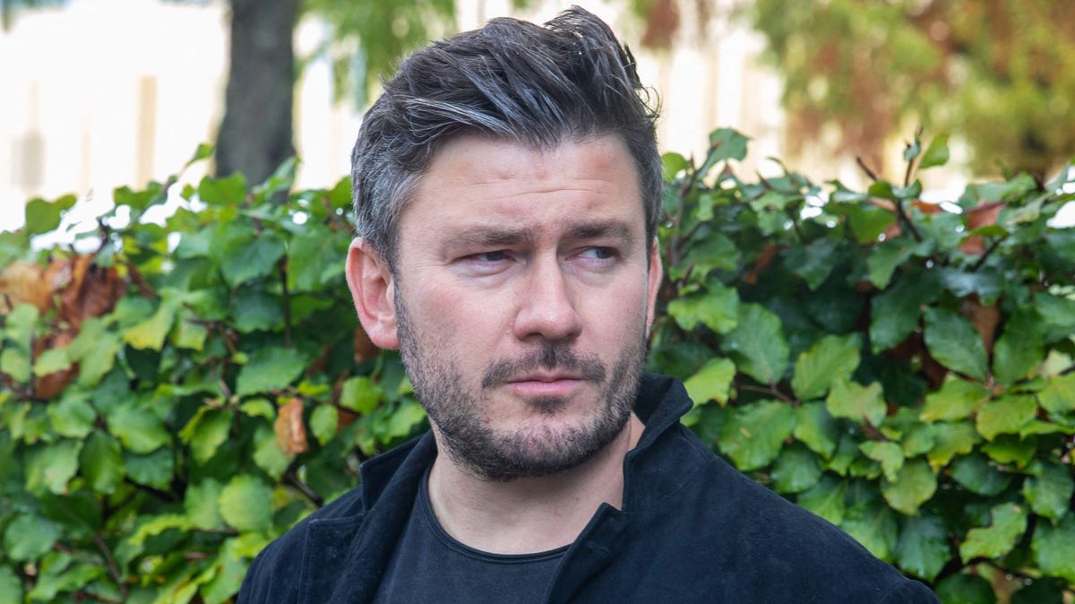 Dissident Russian author Dmitry Glukhovsky poses for a photograph at the 23rd Frankfurt Book Fair at the Messe in Frankfurt am Main, western Germany, on October 21, 2022.