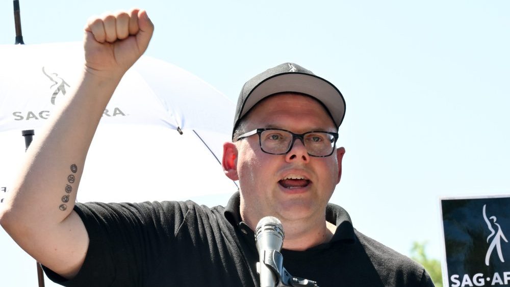 Duncan Crabtree-Ireland speaks at the SAG-AFTRA and WGA strike at Disney Studios on August 22, 2023 in Burbank, California.