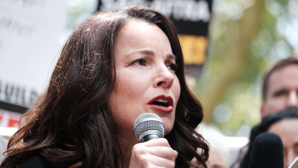 NEW YORK, NEW YORK - AUGUST 01:  SAG-AFTRA President Fran Drescher addresses picketers at New York City Hall on Tuesday as members of the actors SAG-AFTRA union continue to walk the picket line with screenwriters outside of major studios across the country on August 01, 2023 in New York City. Drescher spoke ahead of a New York City Council hearing for resolutions backing the striking actors and writers. Members of SAG-AFTRA, Hollywood’s largest union which represents actors and other media professionals, joined striking WGA (Writers Guild of America) workers in the first joint walkout against the studios since 1960.  (Photo by Spencer Platt/Getty Images)