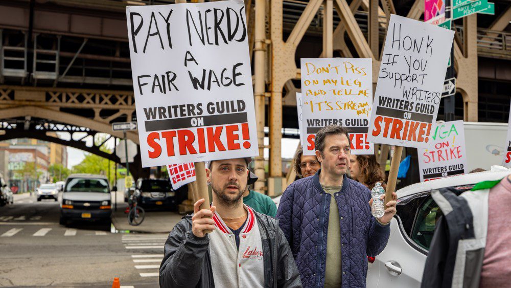 QUEENS, NEW YORK, UNITED STATES - 2023/05/04: Writers Guild of America members march on a picket line in front of Silvercup Studios. After contract negotiations failed, thousands of unionized writers voted unanimously to strike, bringing television production to a halt, and initiating the first walkout in 15 years. (Photo by Michael Nigro/Pacific Press/LightRocket via Getty Images)