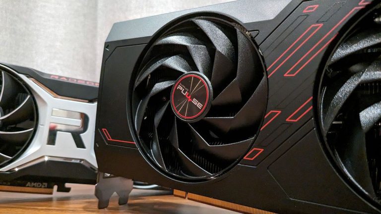 Sapphire Pulse AMD Radeon RX 7700 XT with a 6700 XT behind it