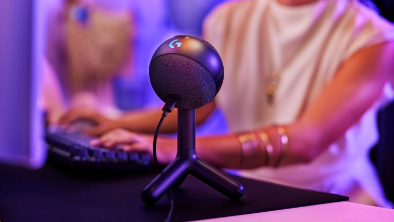 Logitech G Yeti Orb gaming microphone on a desk.