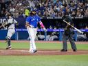 Vladimir Guerrero Jr. des Blue Jays réagit à une frappe contre les Yankees de New York avec les buts chargés pour terminer la troisième manche au Rogers Centre le 26 septembre 2023 à Toronto.