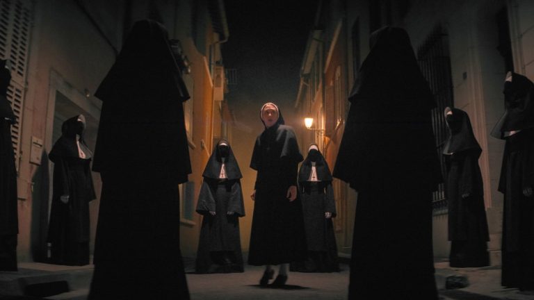 THE NUN II, (aka THE NUN 2), Taissa Farmiga (center), 2023. © Warner Bros. / Courtesy Everett Collection