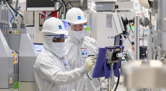 Intel engineers work in Fab 34, an Intel manufacturing facility in Ireland