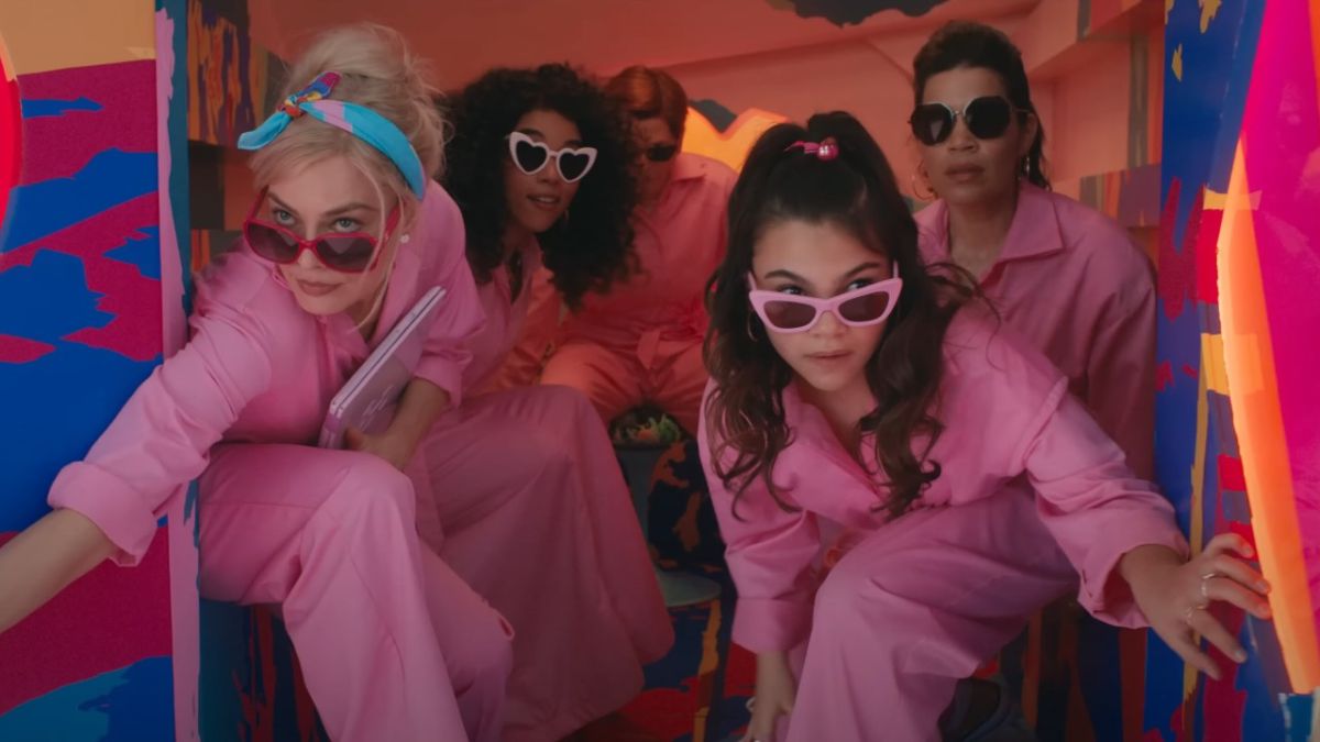 From left to right: Margot Robbie, Alexandra Shipp, America Ferrera and Ariana Greenblatt in pink jumpsuits and sunglasses