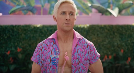 Barbie scene with Ryan Gosling as Ken drinking a beverage wearing a pink shirt