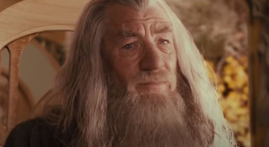 Ian McKellen sits in Rivendell with a concerned look on his face in The Lord of the Rings: The Fellowship of the Ring.