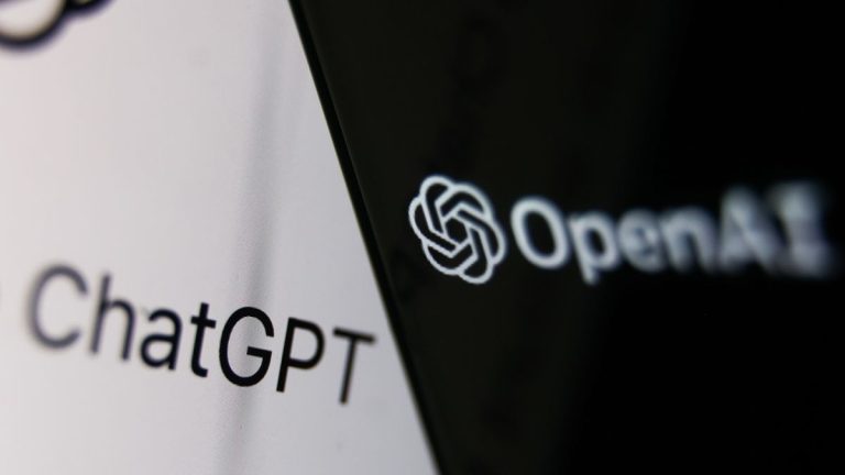 OpenAI logo displayed on a phone screen and ChatGPT website displayed on a laptop screen are seen in this illustration photo taken in Krakow, Poland on December 5, 2022. 