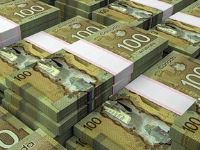 Des piles de monnaie canadienne.  PHOTO PAR ISTOCK /Getty Images