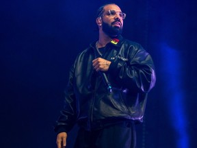 Photo du dossier : Drake se produit lors de la fête d'anniversaire de Lil Baby à la State Farm Arena le samedi 9 décembre 2022, à Atlanta.