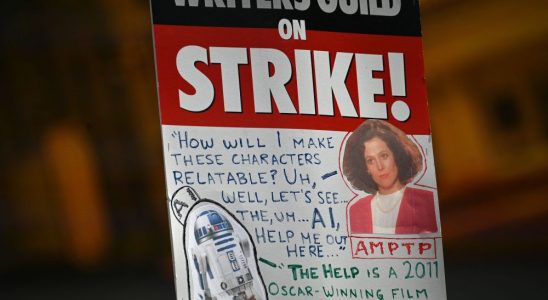 A strike sign is seen on the Hollywood writers picket line outside Universal Studios Hollywood in Los Angeles, California, June 30, 2023. Hollywood's summer of discontent could dramatically escalate this weekend, with actors ready to join writers in a massive "double strike" that would bring nearly all US film and television productions to a halt. The Screen Actors Guild (SAG-AFTRA) is locked in last-minute negotiations with the likes of Netflix and Disney, with the deadline fast approaching at midnight Friday (0700 GMT Saturday). (Photo by Robyn Beck / AFP) (Photo by ROBYN BECK/AFP via Getty Images)