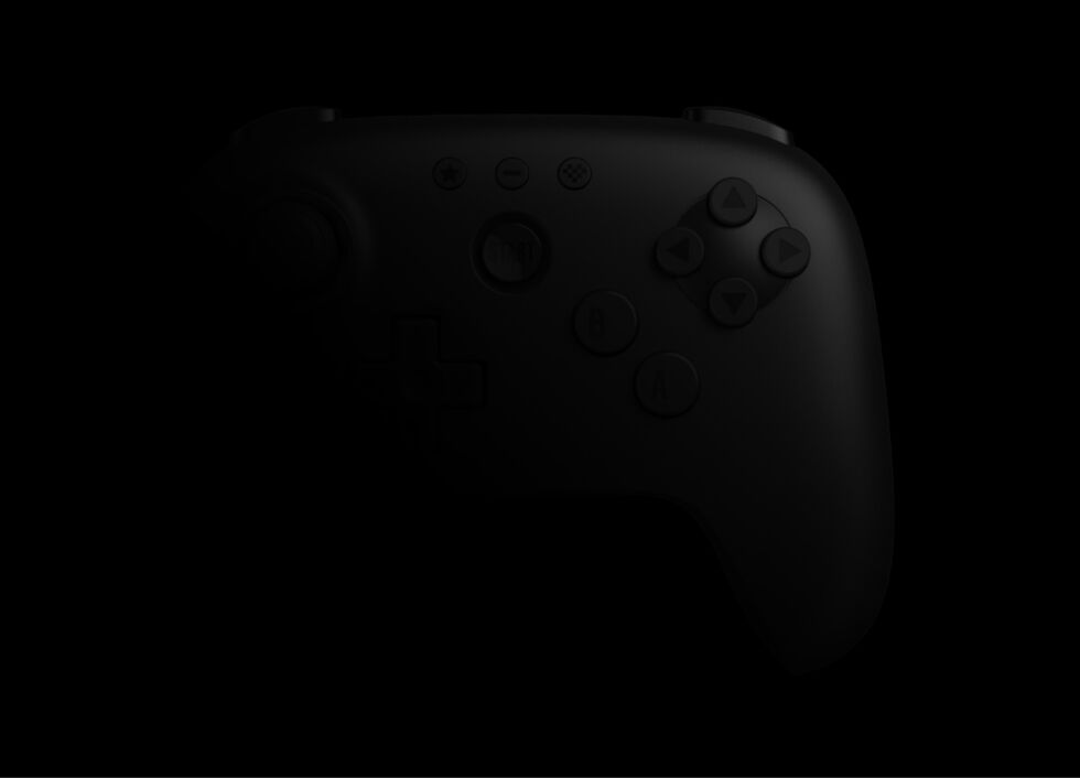 Cette image teaser très sombre suggère un contrôleur conçu par 8BitDo qui pourrait utiliser une conception à deux poignées plus conventionnelle. 