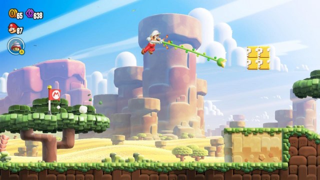 Mario utilisant la vigne grappin dans Super Mario Bros. Wonder