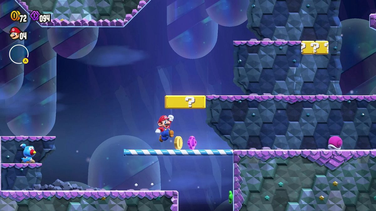 Image of Mario in a dark world collecting Purple Coins in Super Mario Bros. Wonder.