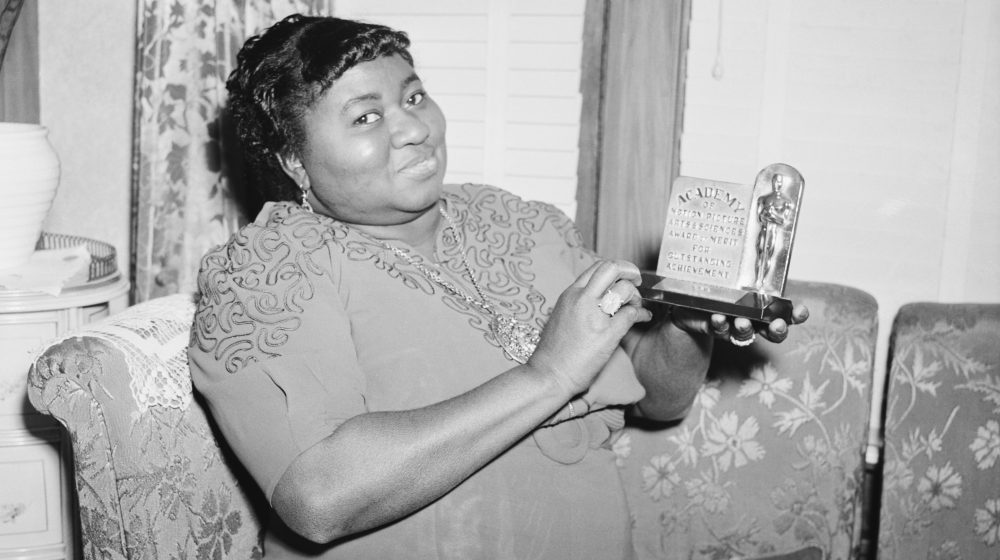 (Original Caption) 3/2/1940- Los Angeles, CA: Actress Hattie Mc Daniel is shown with the statuette she received for her portrayal in "Gone With The Wind." The award was for Best Supporting Role by an Actress, and was made at the 12th annual Academy Awards ceremony.