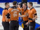 De gauche à droite, le premier Ben Hebert, le deuxième Brett Gallant, le troisième Marc Kennedy et le capitaine Brendan Bottcher lors du Brier Tim Hortons au Budweiser Centre de London, en Ontario, le 11 mars 2023.