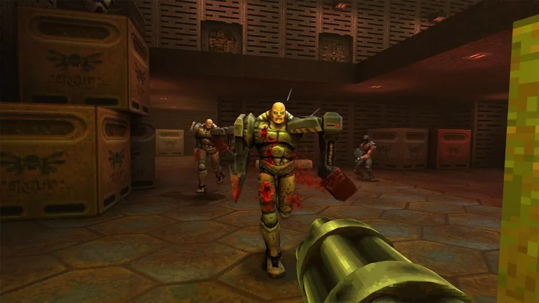 Quake 2: the player about to fire at some Stroggs in a warehouse.