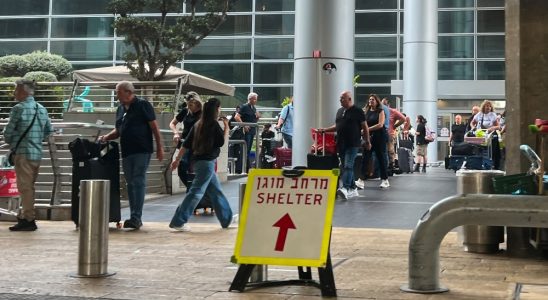 LOD, ISRAEL - OCTOBER 09: A 'shelter' sign is displayed near an entrance to the arrivals terminal at Ben Gurion Airport on October 09, 2023 in Lod, Israel. On Saturday, the Palestinian militant group Hamas launched the largest surprise attack from Gaza in a generation, sending thousands of missiles and an unknown number of fighters by land, who shot and kidnapped Israelis in communities near the Gaza border. The attack prompted retaliatory strikes on Gaza and a declaration of war by the Israeli prime minister. (Photo by Alexi J. Rosenfeld/Getty Images)