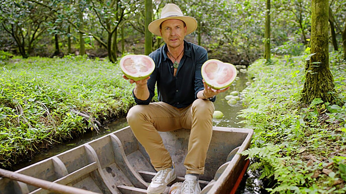 Photo of Phil Keoghan during the melon challenge in Season 35 of The Amazing Race