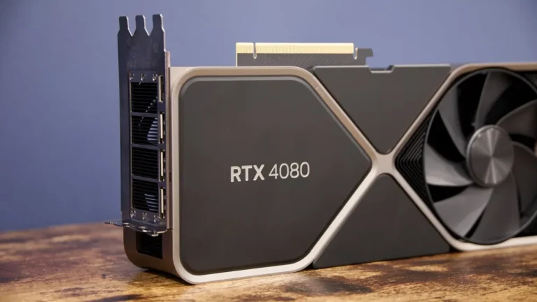 Photo of an Nvidia RTX 4080 graphics card on a wooden desk.