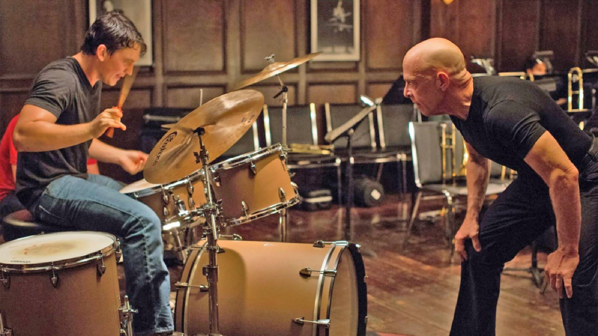 Miles Teller dans le rôle d'Andrew Neiman et JK Simmons dans le rôle de Terence Fletcher dans Whiplash