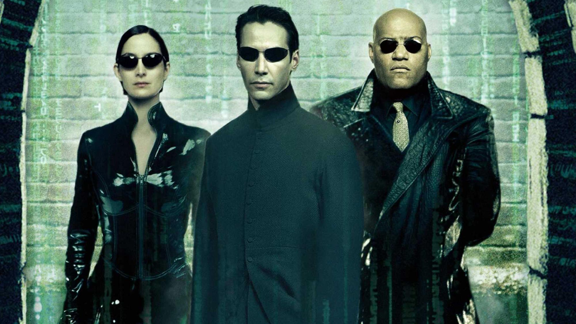 Carrie-Anne Moss, Keanu Reeves et Laurence Fishburne dans Matrix