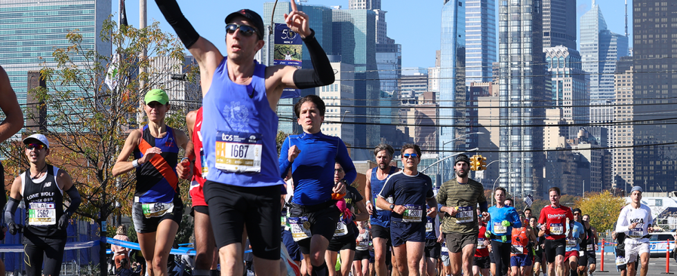 Participants run during the TCS New York City Marathon in New York City, United States on November 07, 2021