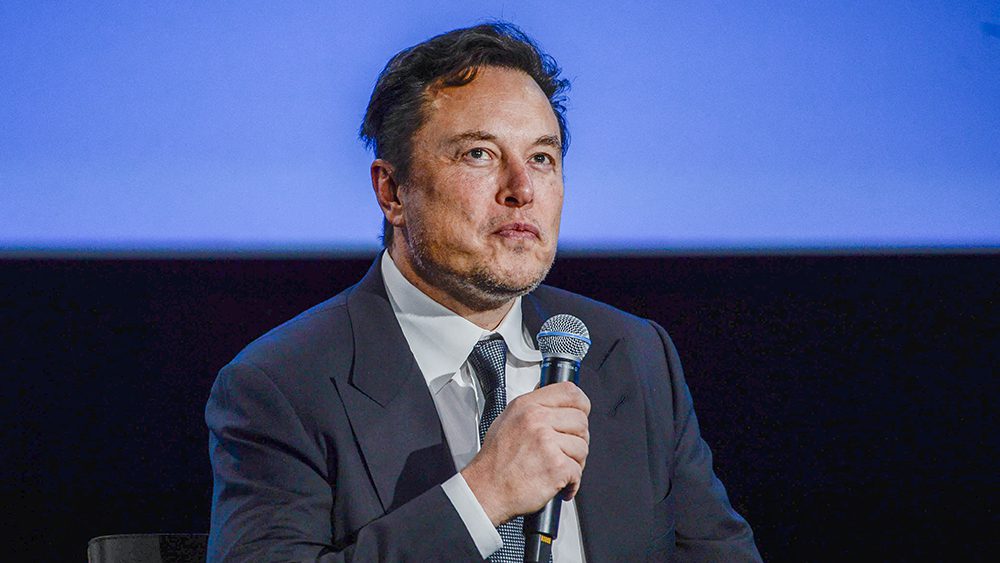 Tesla CEO Elon Musk looks up as he addresses guests at the Offshore Northern Seas 2022 (ONS) meeting in Stavanger, Norway on August 29, 2022. - The meeting, held in Stavanger from August 29 to September 1, 2022, presents the latest developments in Norway and internationally related to the energy, oil and gas sector. - Norway OUT (Photo by Carina Johansen / NTB / AFP) / Norway OUT (Photo by CARINA JOHANSEN/NTB/AFP via Getty Images)