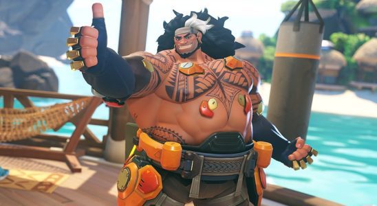 Le 39ème héros d'Overwatch 2 est le char Mauga, brandissant un double canon à chaîne