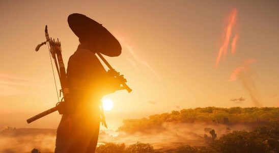 The script for the Ghost of Tsushima movie is complete. The image shows a samurai playing a flute while silhouetted by the setting sun.