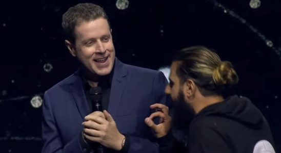 Geoff Keighley is interrupted by a stage crasher during Opening Night Live 2023.