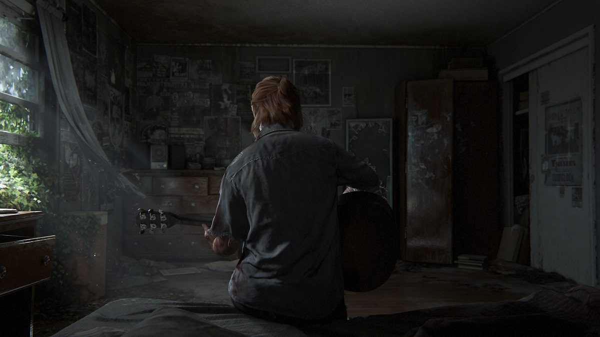 The Last of Us Part 2: Ellie playing guitar with he rback to the camera.