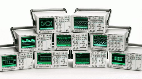 HP oscilloscopes stacked atop of one another.