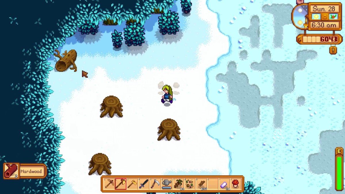 Un joueur dans la forêt de Stardew Valley.  Cette image fait partie d'un article sur la façon d'obtenir du bois dur à Stardew Valley.