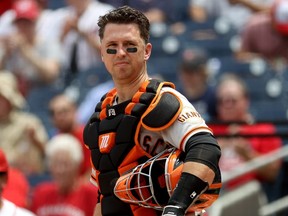 Le receveur Buster Posey des Giants de San Francisco affronte les Nationals de Washington en 2021.