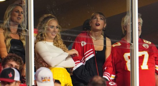 Taylor Swift watches as the Kansas City Chiefs face the Denver Broncos at GEHA Field at Arrowhead Stadium on October 12, 2023 in Kansas City, Missouri with Brittany Mahomes and Ed Kelce.